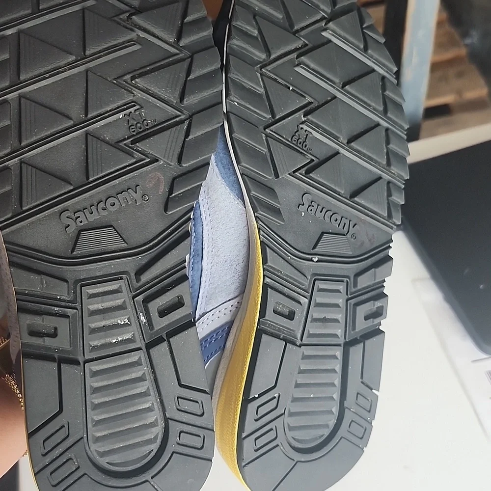 Saucony Blue and Yellow Sneakers Small stains of ink on both tennis in front